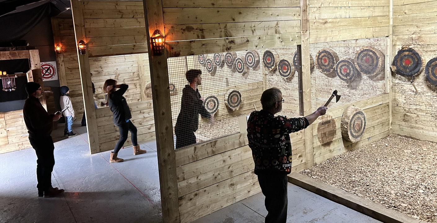 Things to do in Colchester - family throwing axes at Valhalla Lanes