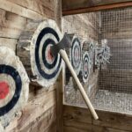 Close-up of a bullseye hit during an axe-throwing session at Valhalla Lanes